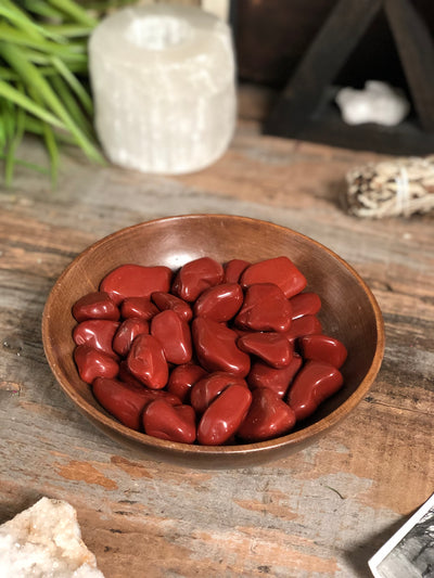 Red jasper in a bowl display.